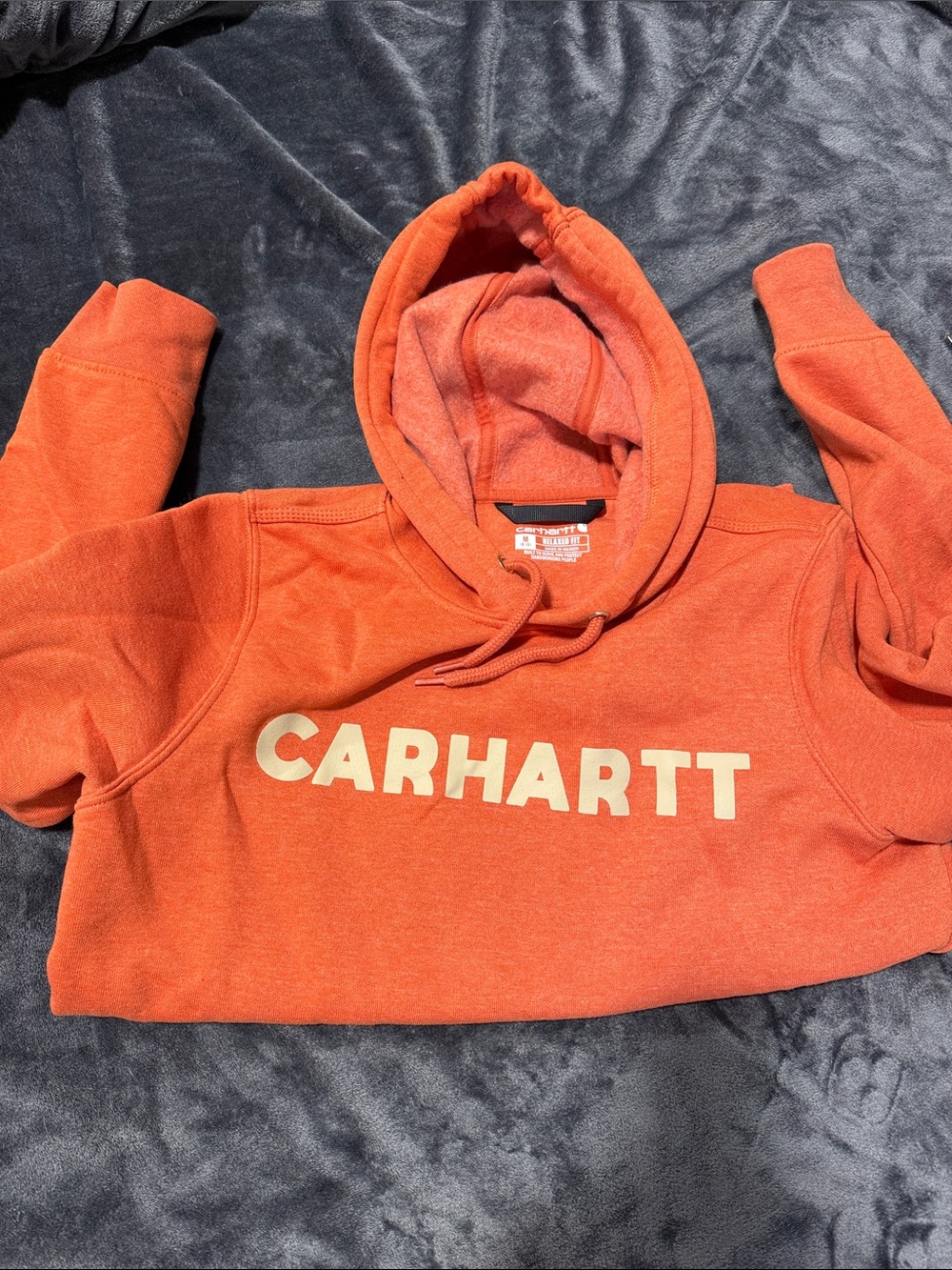 Carhartt Women’s medium orange sweatshirt